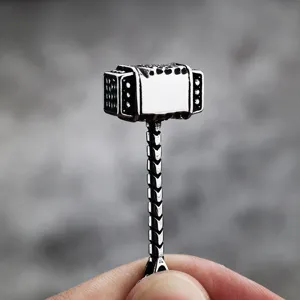 Retro stainless steel Viking Thor hammer pendant detail, vintage men's necklace jewelry accessory.