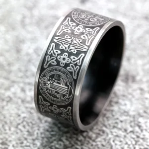 Retro stainless steel men's ring featuring St. Benedict cross and detailed vintage carvings.