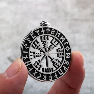 Stainless steel Viking compass pendant detail shot, Norse retro rune engraved necklace.