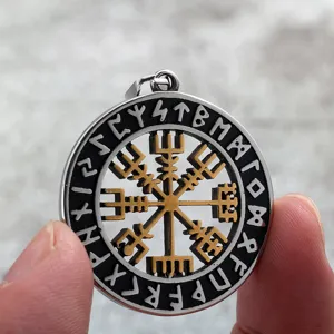 Stainless steel Viking compass pendant detail shot, retro Nordic rune engraved jewelry.