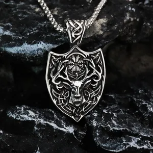 Detailed view of the vintage viking deer shield pendant, nordic compass metal necklace closeup