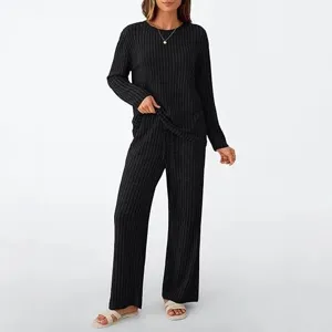 Black ribbed knit loungewear set detail view showing soft texture and comfortable fit.