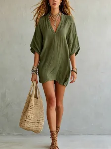 Detailed view of the women's olive green v-neck loose casual tunic top for summer.