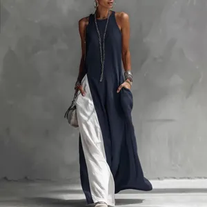 Detailed view of the sleeveless color-block loose pocket casual long dress in stylish wear.
