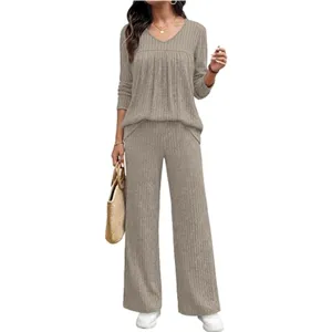 Detailed display of the stylish khaki ribbed knit long-sleeve top and wide-leg pants set.