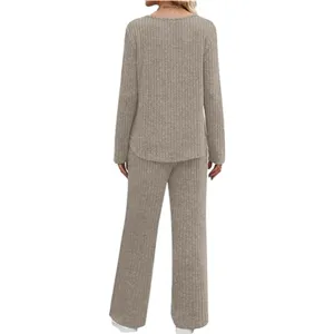 Ribbed knit lounge set for women, featuring a long sleeve top and wide leg pants in beige.
