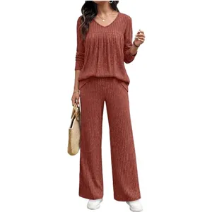 Detailed view of the ribbed V-neck long sleeve top and wide leg pants lounge set fabric.