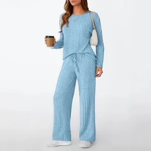 Stylish light blue ribbed long sleeve top and wide leg pants loungewear set for women.