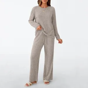 Detailed view of women casual ribbed knit lounge set featuring long sleeve top and cozy pants.