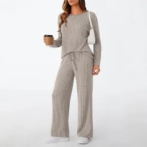 Ribbed knit lounge set detail, comfortable long sleeve top and wide leg pants for daily wear.