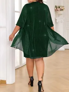 Details of the dark green plus-size mesh casual dress showing back view and glitter fabric.
