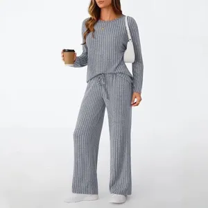 Women's ribbed knit loungewear set featuring a crewneck long sleeve top and casual pants.