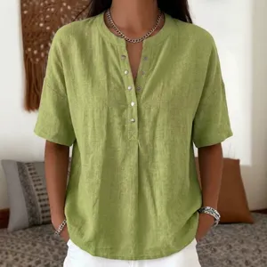 Casual green V-neck button-up short sleeve loose blouse for women summer daily wear.