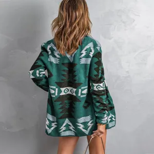 Back view of a green geometric patterned knitted cardigan, loose fit autumn winter fashion.