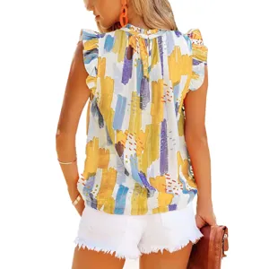 Detailed view of women summer sleeveless ruffle blouse with colorful abstract print.