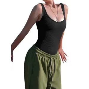 Close-up detail view of the black ribbed sleeveless scoop neck tight bodysuit for women.