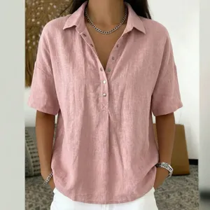 Detailed view of the casual pink short sleeve polo shirt, soft fabric and loose fit design.