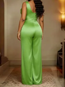 Back detail of a green satin sleeveless wide leg jumpsuit showcasing the elegant fit and flow.