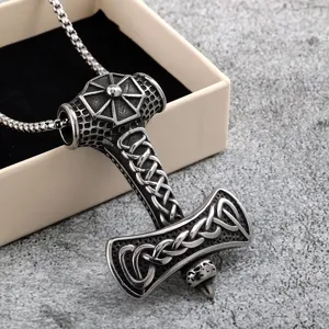 Close-up view of the stainless steel Viking Thor hammer pendant necklace resting in a gift box.