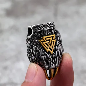 Men stainless steel Viking claw pendant detail shot, retro silver and gold tone jewelry.
