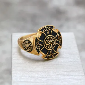Vintage stainless steel ring with Celtic cross Viking shield design, retro black and gold band.