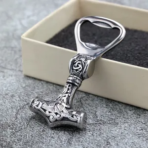 Close-up detail of Viking Thor hammer bottle opener stainless steel vintage tool.
