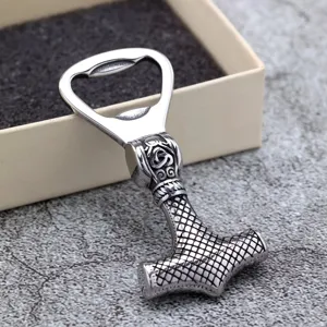 Detailed close-up of a stainless steel Viking Thor hammer bottle opener with retro texture.