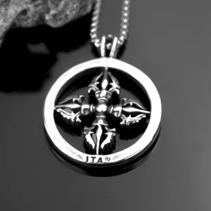Vintage stainless steel dorje cross pendant necklace detail shot showing intricate metalwork.
