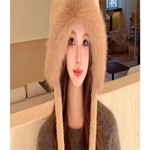 Fluffy faux fur trapper hat for women, thick warm winter earflap cap with cute plush design detail.