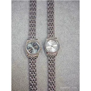 E-LY women quartz watch with alloy metal link strap and sparkling rhinestone dial details.