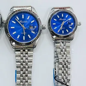 RUILIDA koppel quartz horloge met blauwe wijzerplaat, geribbelde bezel, stalen band.