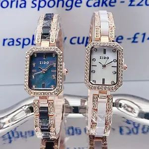 Elegant rectangular women quartz watch with rhinestone bezel and chic ceramic linked bracelet.