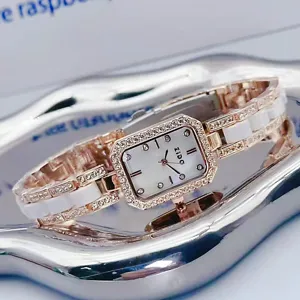 Detail close-up of ZIDO women rectangle rhinestone ceramic quartz bracelet watch shiny.