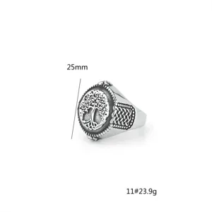 Men's stainless steel vintage tree of life ring detail view showcasing intricate engraved design.