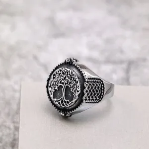 Close-up detail shot of the retro stainless steel Viking tree of life men's ring.
