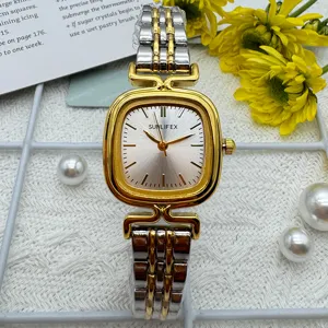Detail shot of vintage square dial women watch with two-tone metal strap and clean dial.