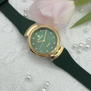Vintage green dial quartz watch for women with gold case and dark green silicone strap chic
