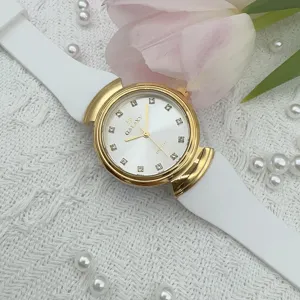 Vintage style women quartz watch with white silicone strap and diamond dial markers.