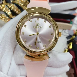 GALAXY quartz watch with pink silicone strap gold case and sparkling rhinestone dial details.