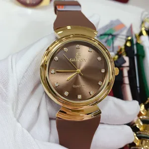 Vintage style women quartz watch with brown silicone strap and crystal markers for daily wear.
