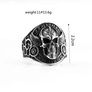 Detailed close-up view of vintage stainless steel skull ring with size and weight.