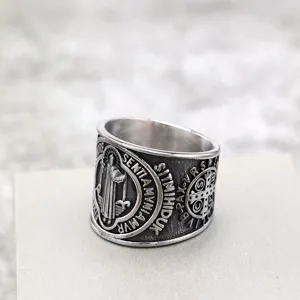 Vintage stainless steel men ring with St Benedict cross exorcism engraving, bold retro jewelry.