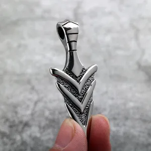 Close-up detail of retro stainless steel arrow pendant necklace with polished silver finish.
