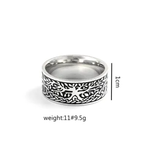 Stainless steel tree of life ring detail closeup view, clear vintage engraving texture.