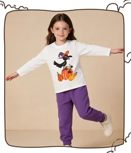 Girls long sleeve t-shirt with halloween pumpkin print and purple pants casual outfit