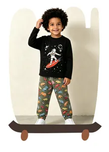 Detailed view of kids knit cotton set, featuring astronaut graphic sweatshirt and printed joggers.