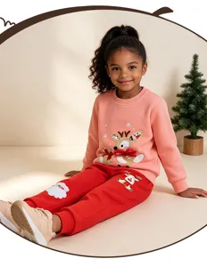 Charming kids holiday sweatshirt and sweatpants set detail, featuring cute reindeer appliques.
