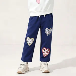 Kids casual blue sweatpants with cute heart patch embroidery, soft cotton fabric for daily wear.