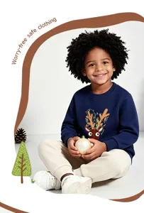 Details of boys Christmas reindeer embroidered crewneck sweatshirt in dark blue for kids.