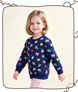 Sweat-shirt mignon pour fille avec motifs de nœuds et cœurs colorés, manches longues.